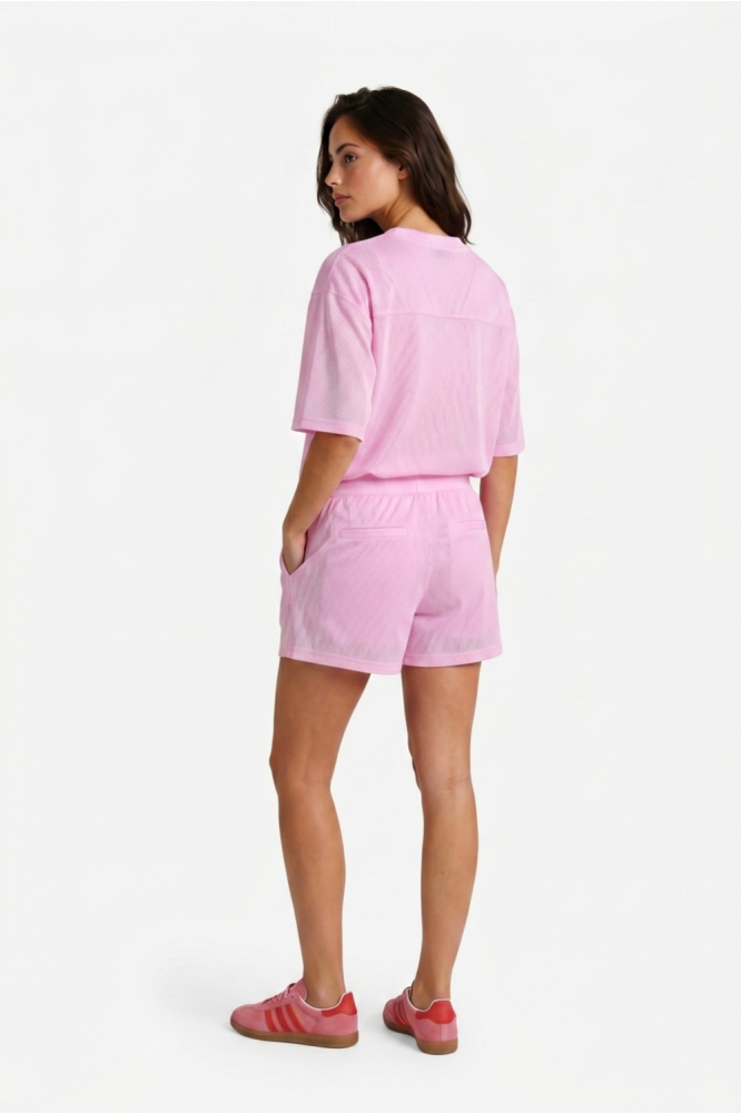 Fluresk roze dames t-shirt | Model achteraanzicht