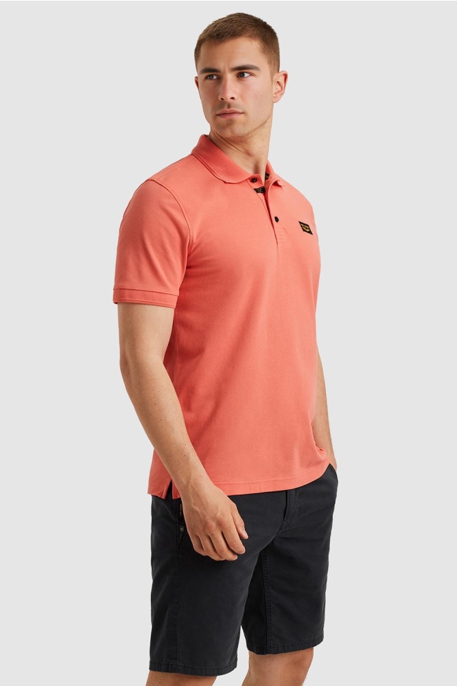 PME legend oranje heren polo | Model zijaanzicht