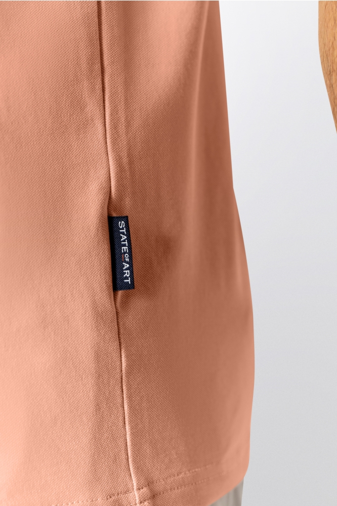 State of Art oranje heren polo | Close up