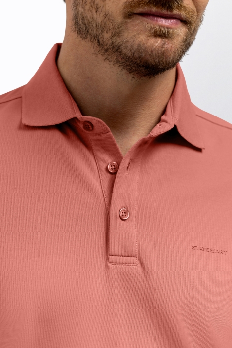 State of Art oranje heren polo | Close up