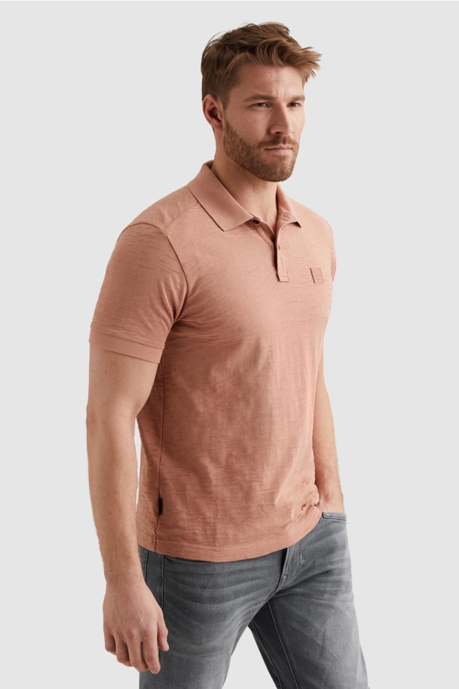 PME legend oranje heren polo | Model vooraanzicht