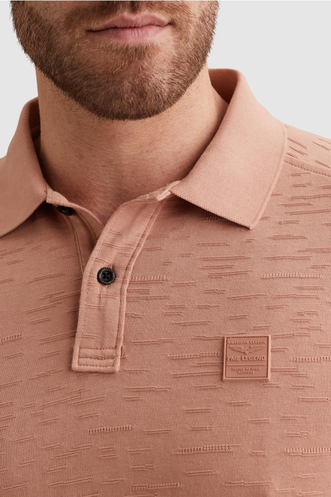 PME legend oranje heren polo | Close up