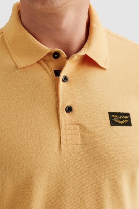 PME legend oranje heren polo | Close up