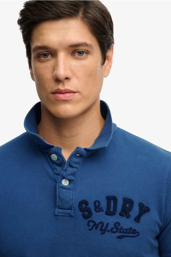 Superdry blauwe heren polo | Sfeerbeeld, In situatie