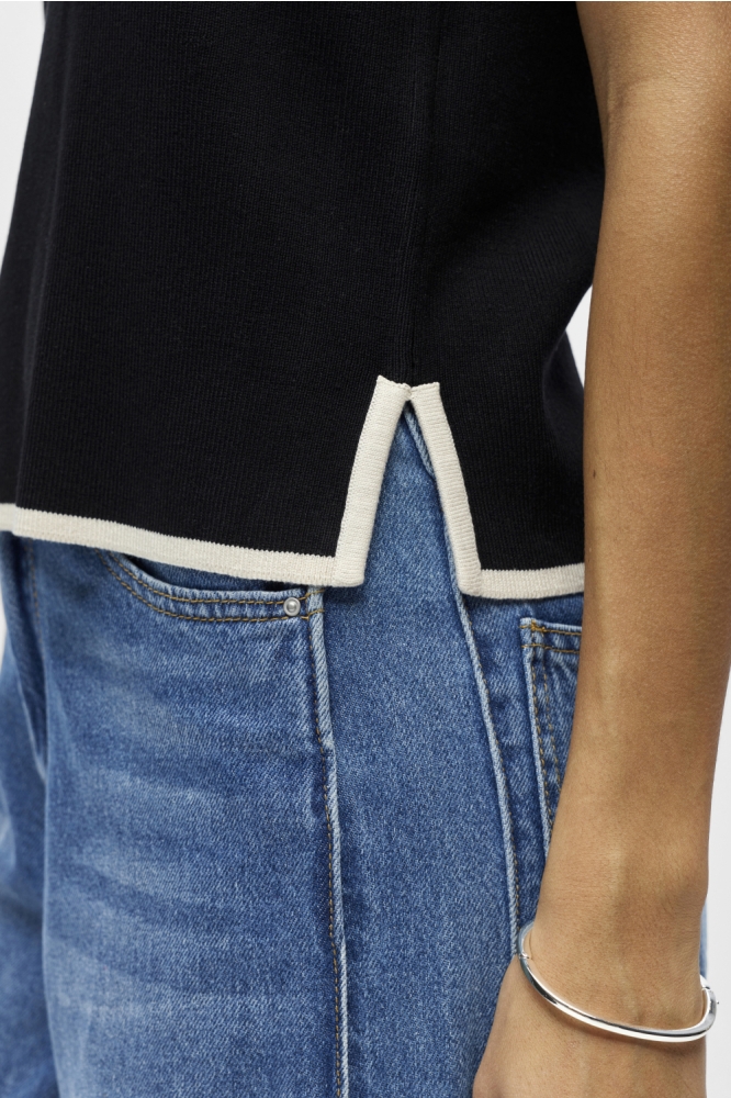 Object zwarte dames top | Close up