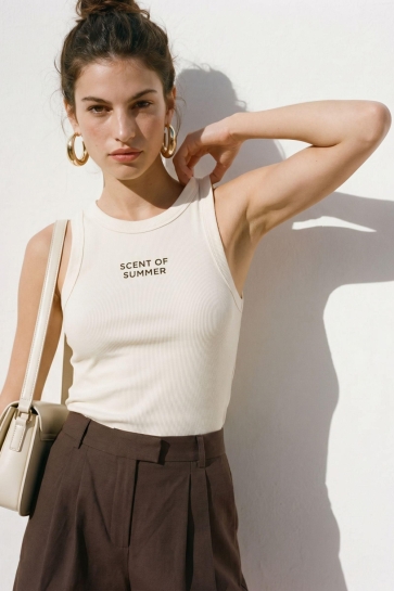 Vero Moda Top VMNIRA CAISA SL TANK TOP BOX JRS 10341982 SNOW WHITE/TEXT