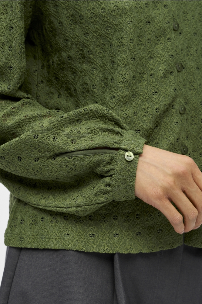 Object groene dames blouse | Close up
