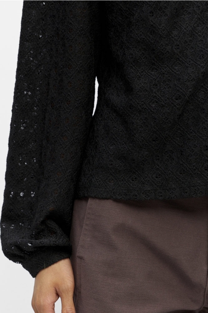 Object zwarte dames blouse | Close up