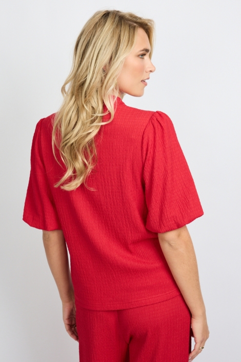 Fluresk rode dames blouse | Model achteraanzicht