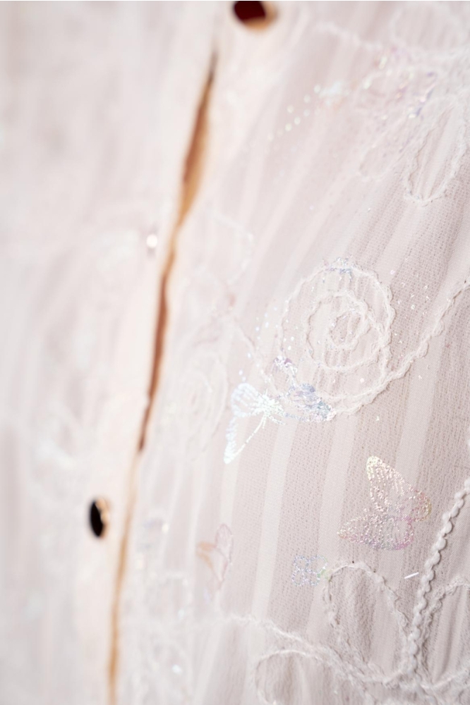 I-coni-K ecru dames blouse | Close up