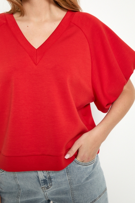 Peppercorn rode dames sweater | Close up