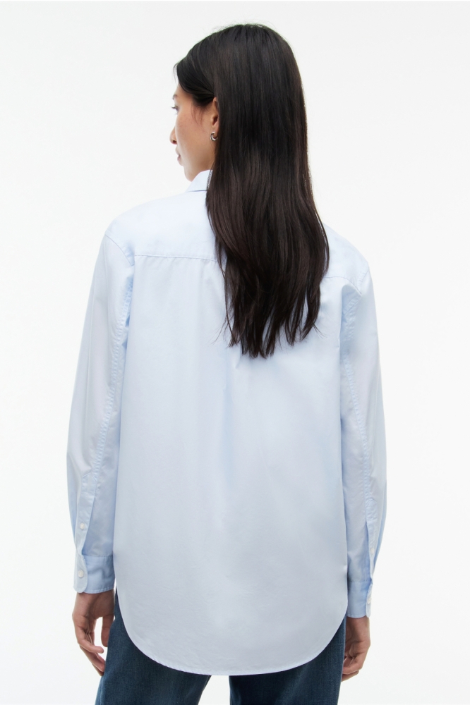 Tommy Jeans blauwe dames blouse | Model achteraanzicht
