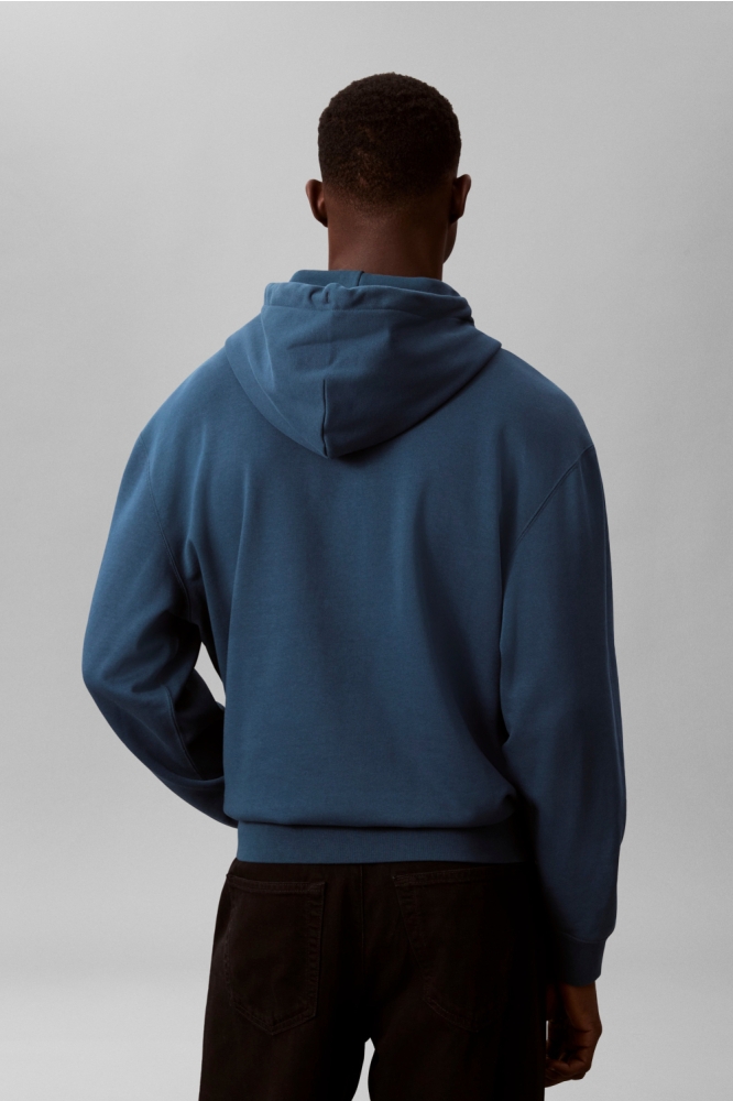 Calvin Klein blauwe heren sweater | Model achteraanzicht