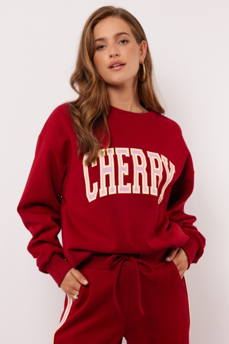 Fluresk rode dames sweater | Model vooraanzicht