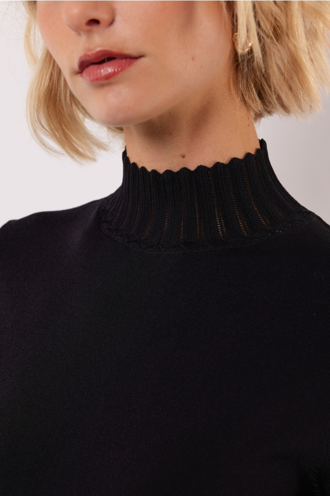 Fluresk zwarte dames sweater | Close up