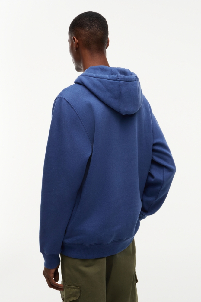 Tommy Jeans blauwe heren sweater | Model achteraanzicht