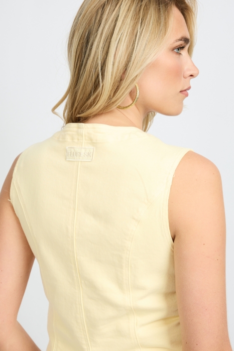 Fluresk gele dames gilet | Close up