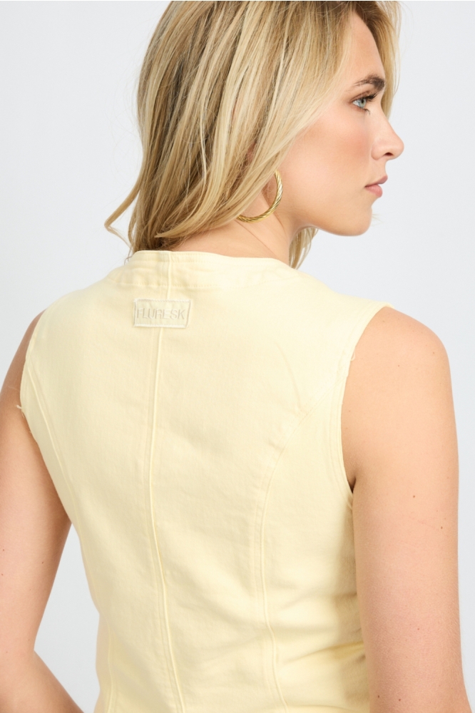 Fluresk gele dames gilet | Close up