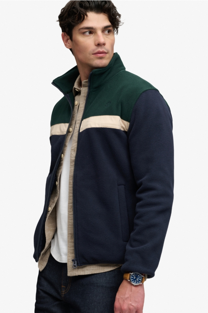 Superdry blauwe heren vest | Model zijaanzicht
