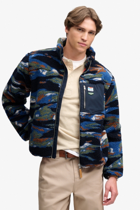 Superdry blauwe heren jas | Model vooraanzicht