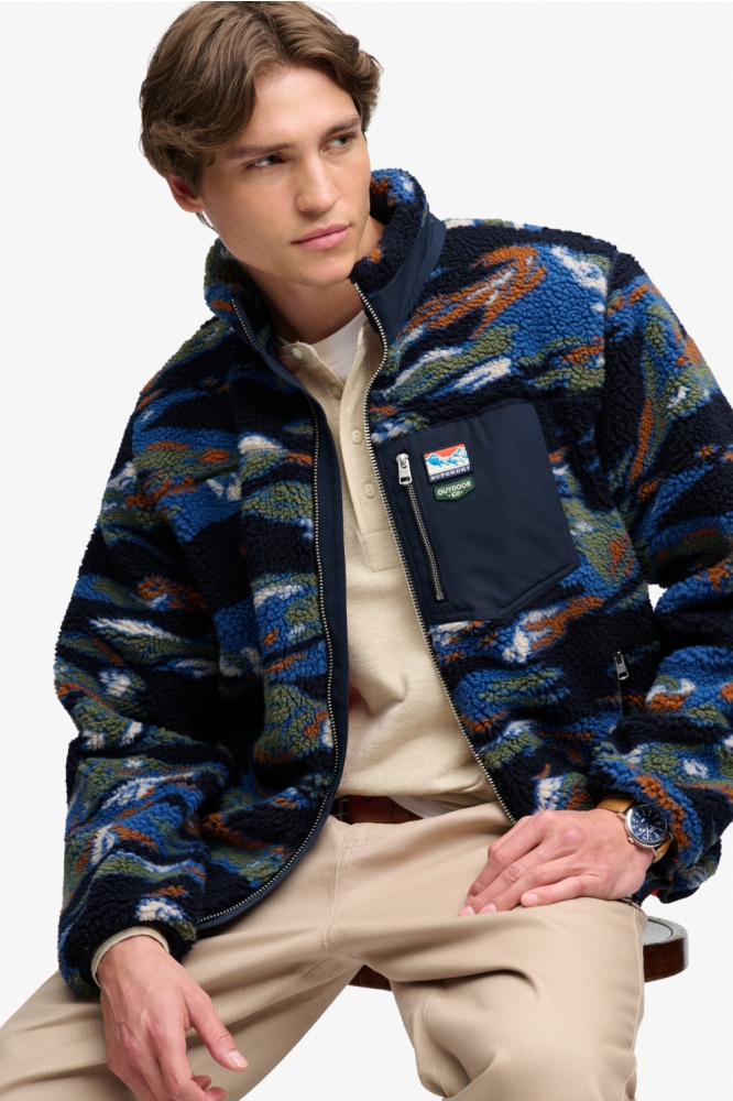 Superdry blauwe heren jas | Model vooraanzicht