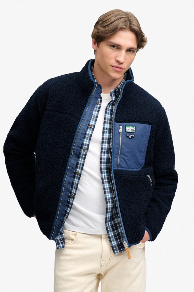 Superdry blauwe heren vest | Model vooraanzicht