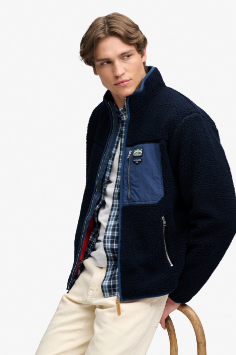 Superdry blauwe heren vest | Model zijaanzicht