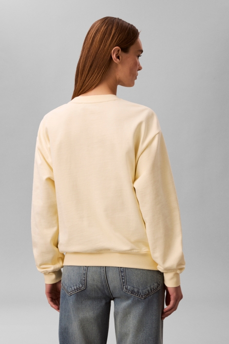 Calvin Klein gele dames sweater | Model achteraanzicht