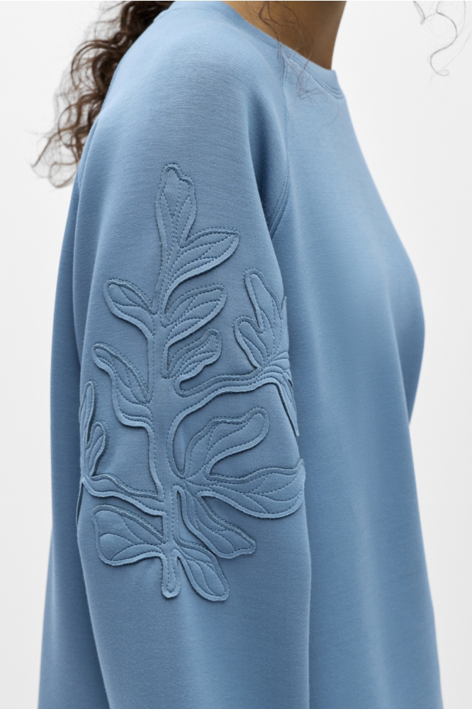 Object blauwe dames sweater | Close up