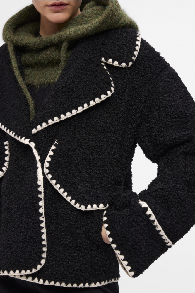 Object zwarte dames jas | Close up