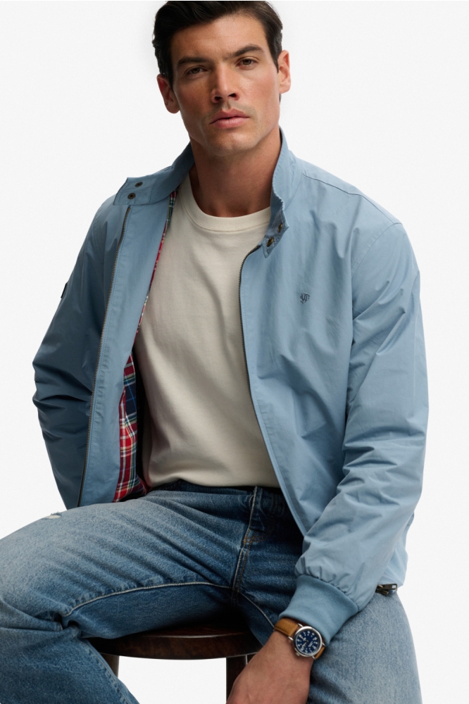 Superdry blauwe heren jas | Model vooraanzicht