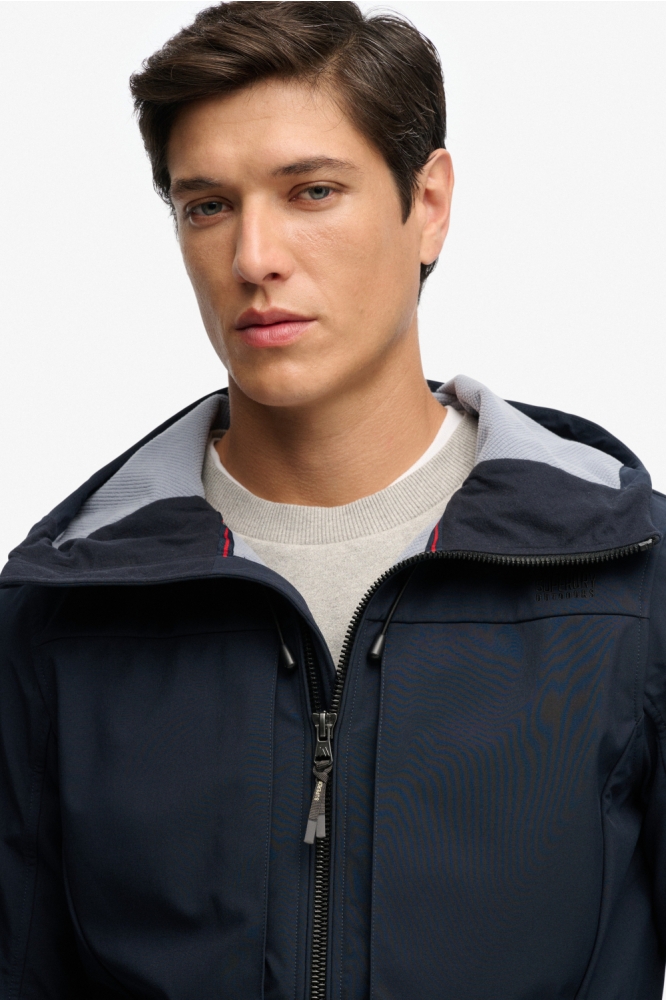 Superdry blauwe heren jas | Close up