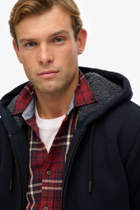 Superdry blauwe heren vest | Close up