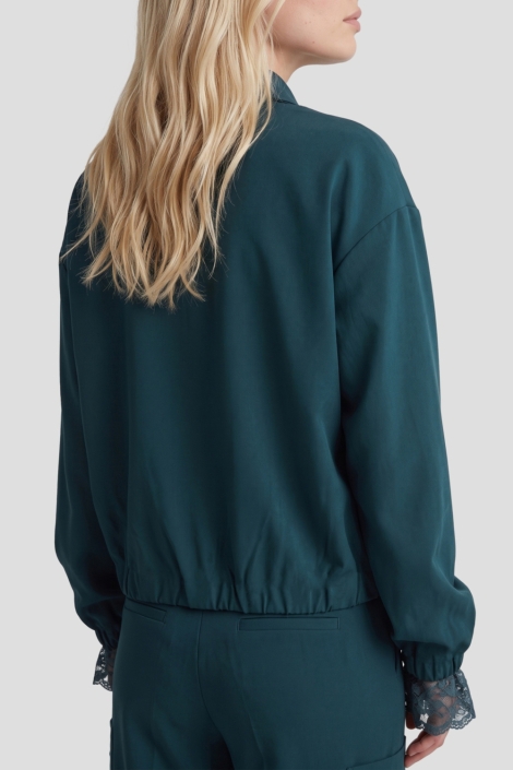 Fluresk groene dames blazer | Model achteraanzicht