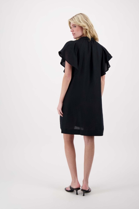 Zusss zwarte dames jurk | Model achteraanzicht