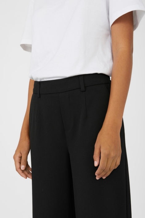 Object zwarte dames broek | Close up