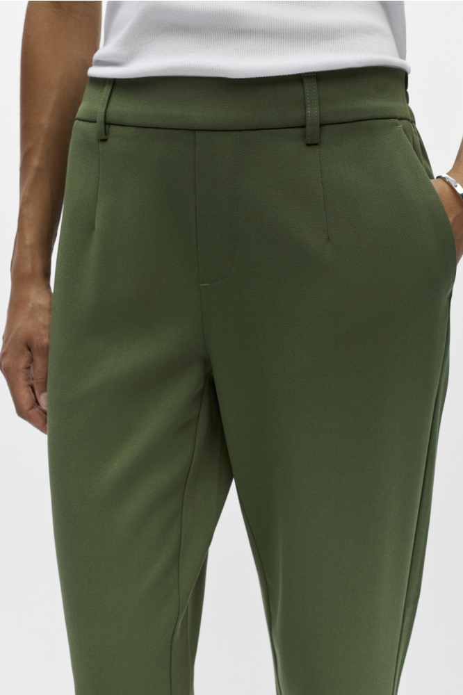 Object groene dames broek | Close up