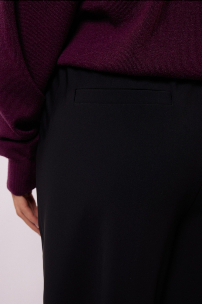 Fluresk zwarte dames broek | Close up