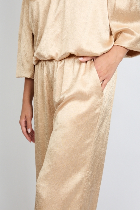 Fluresk gouden dames broek | Close up