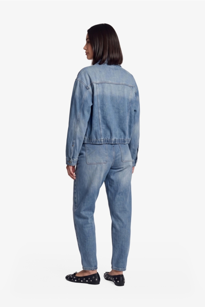 Fluresk blauwe dames jeans | Model achteraanzicht