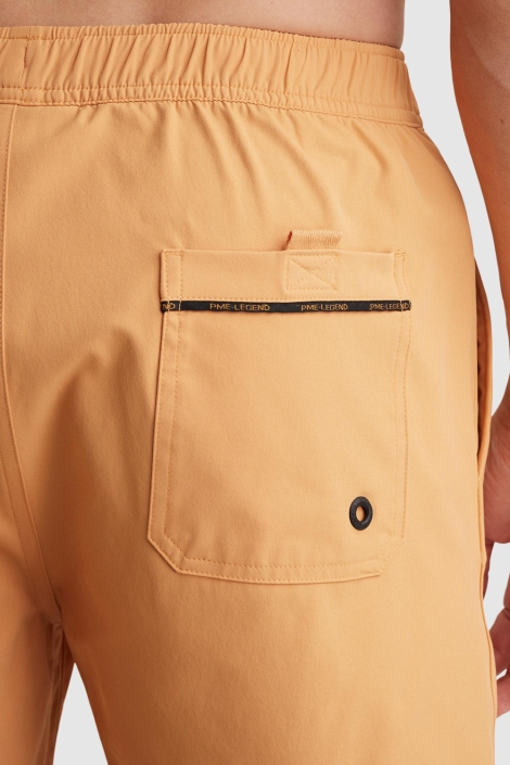 PME legend oranje heren korte broek | Close up