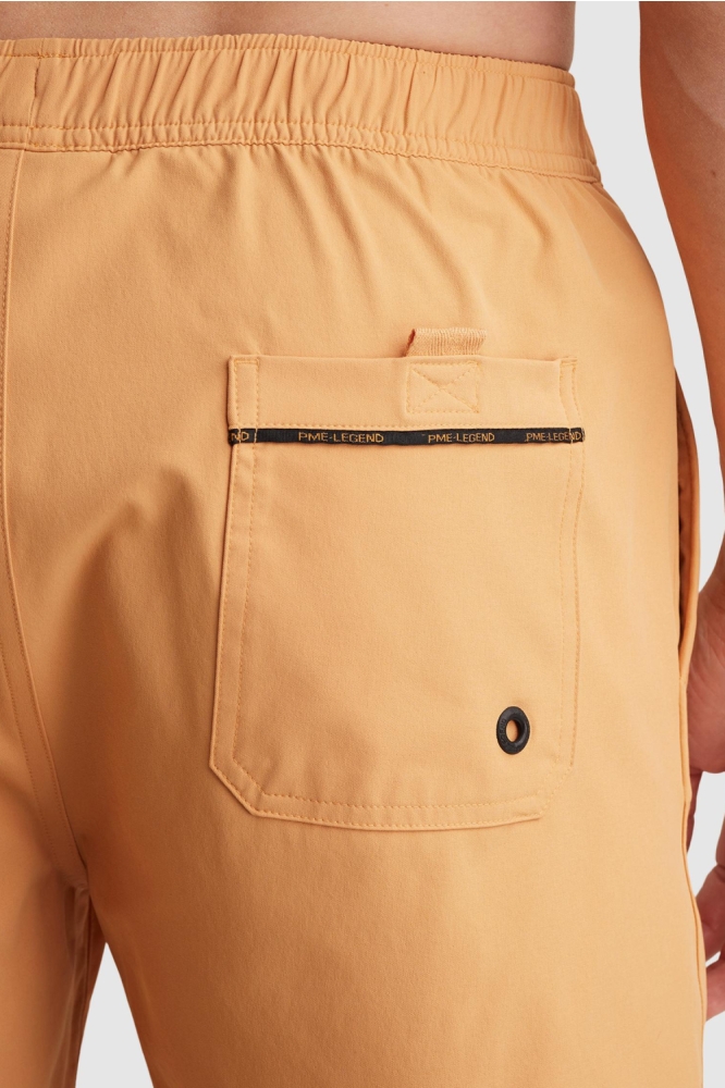 PME legend oranje heren korte broek | Close up